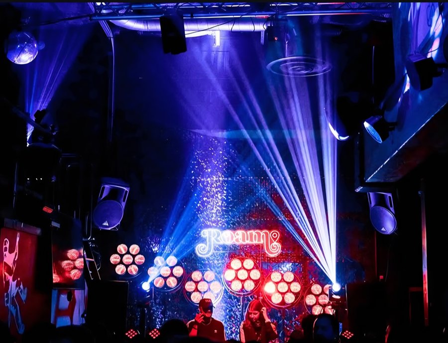 Roam main room under blue lasers