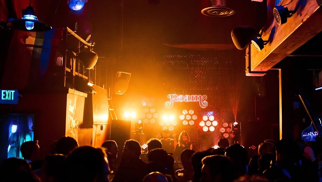 Packed floor facing the stage at Roam, Seattle